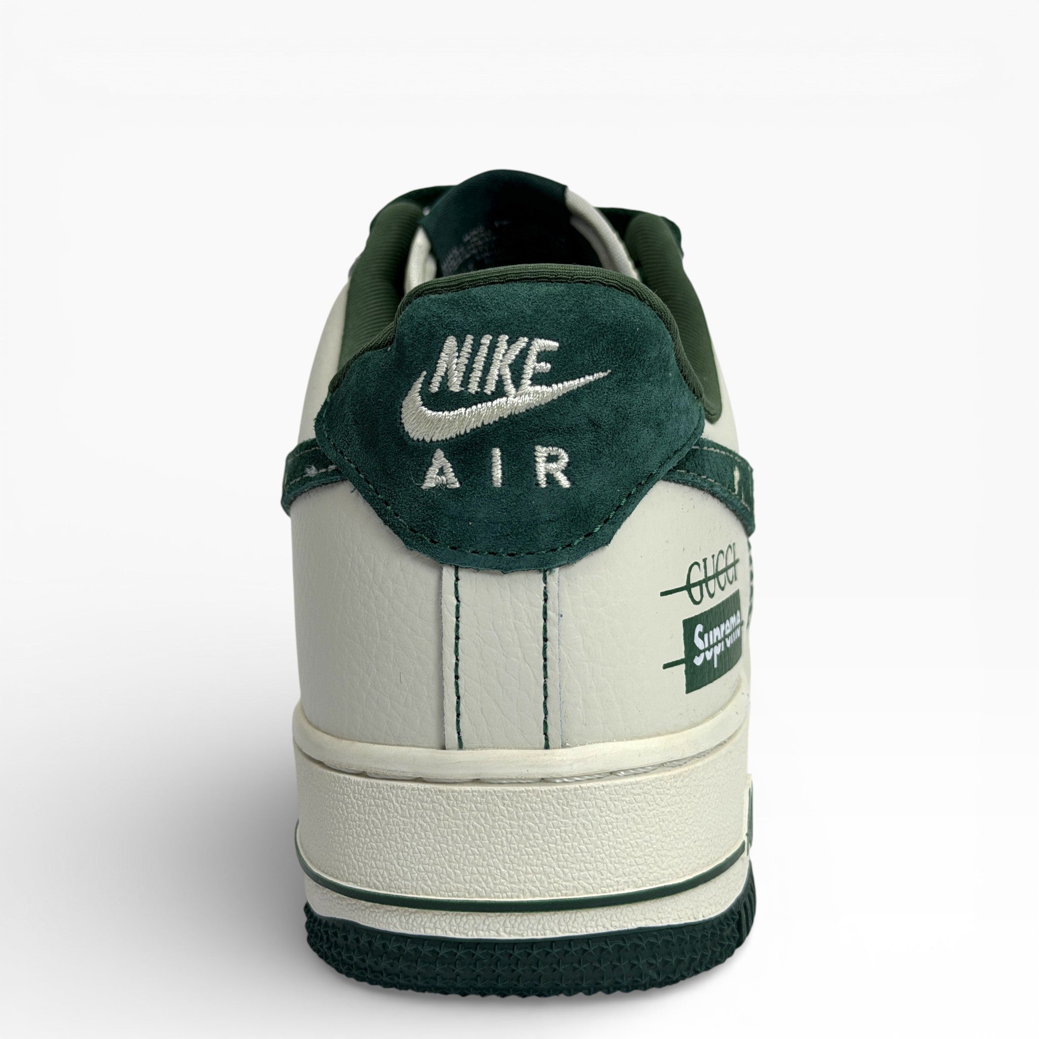 Nike Air Force 1 Low in a custom green and white colorway with Gucci and Supreme branding