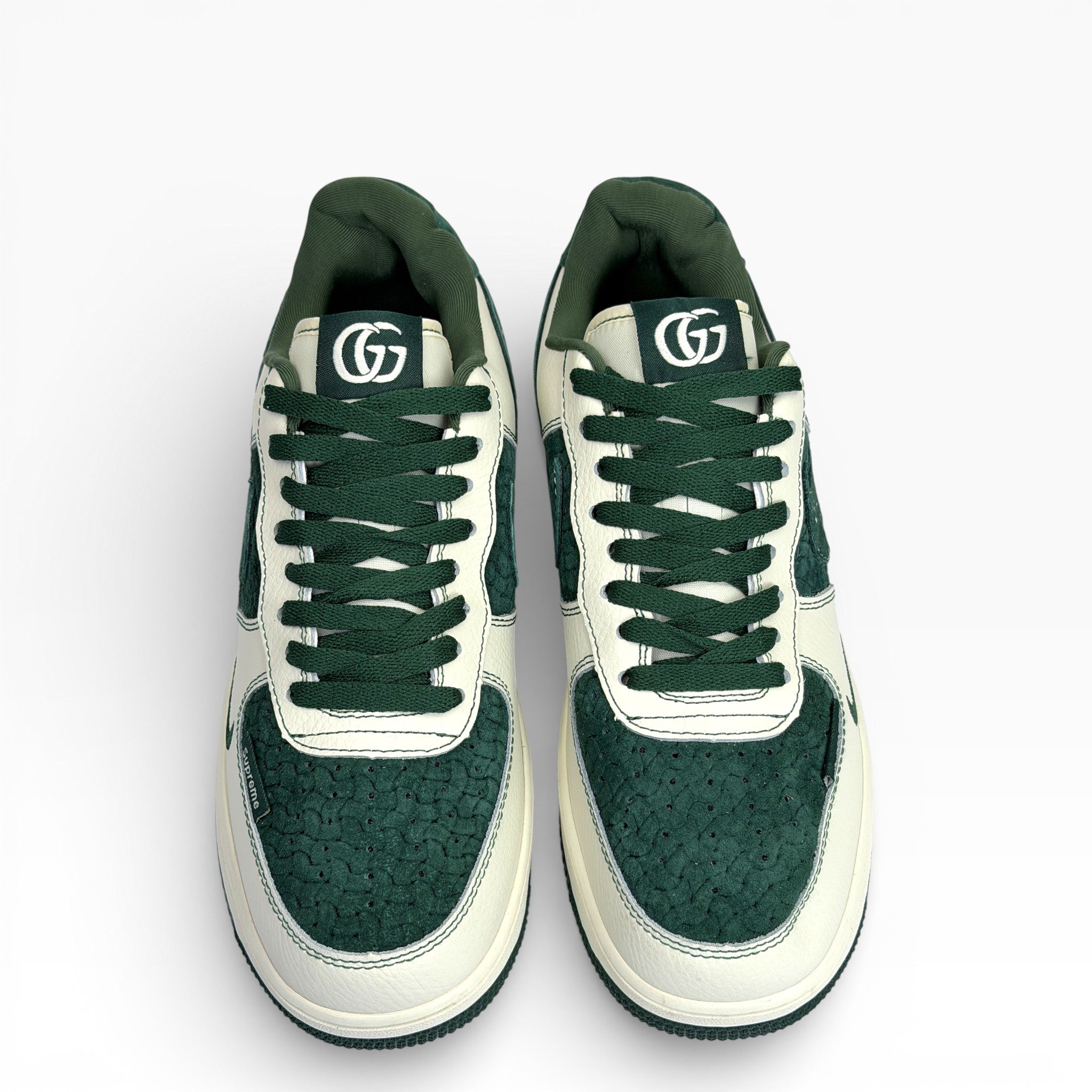 Nike Air Force 1 Low in a custom green and white colorway with Gucci and Supreme branding