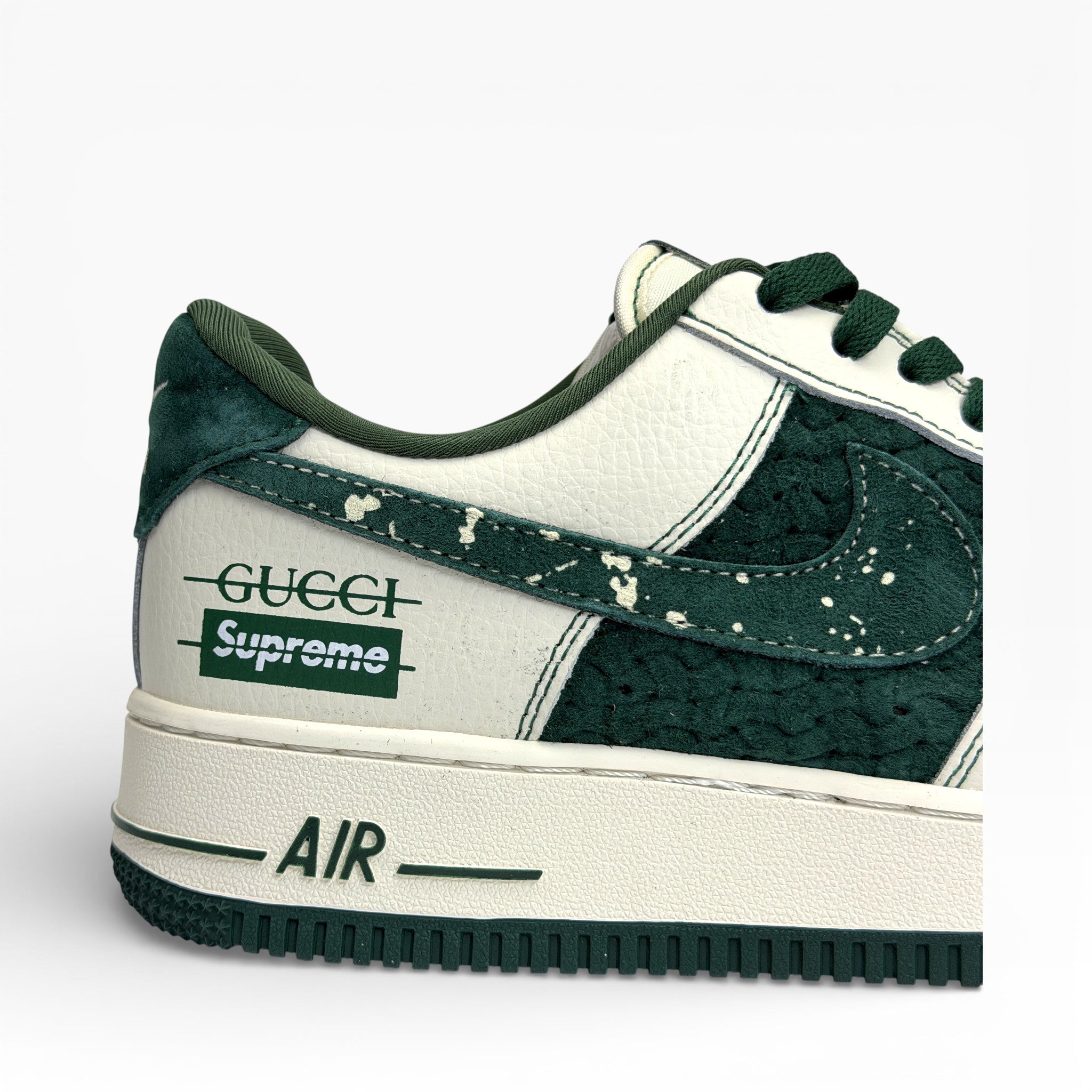 Nike Air Force 1 Low in a custom green and white colorway with Gucci and Supreme branding