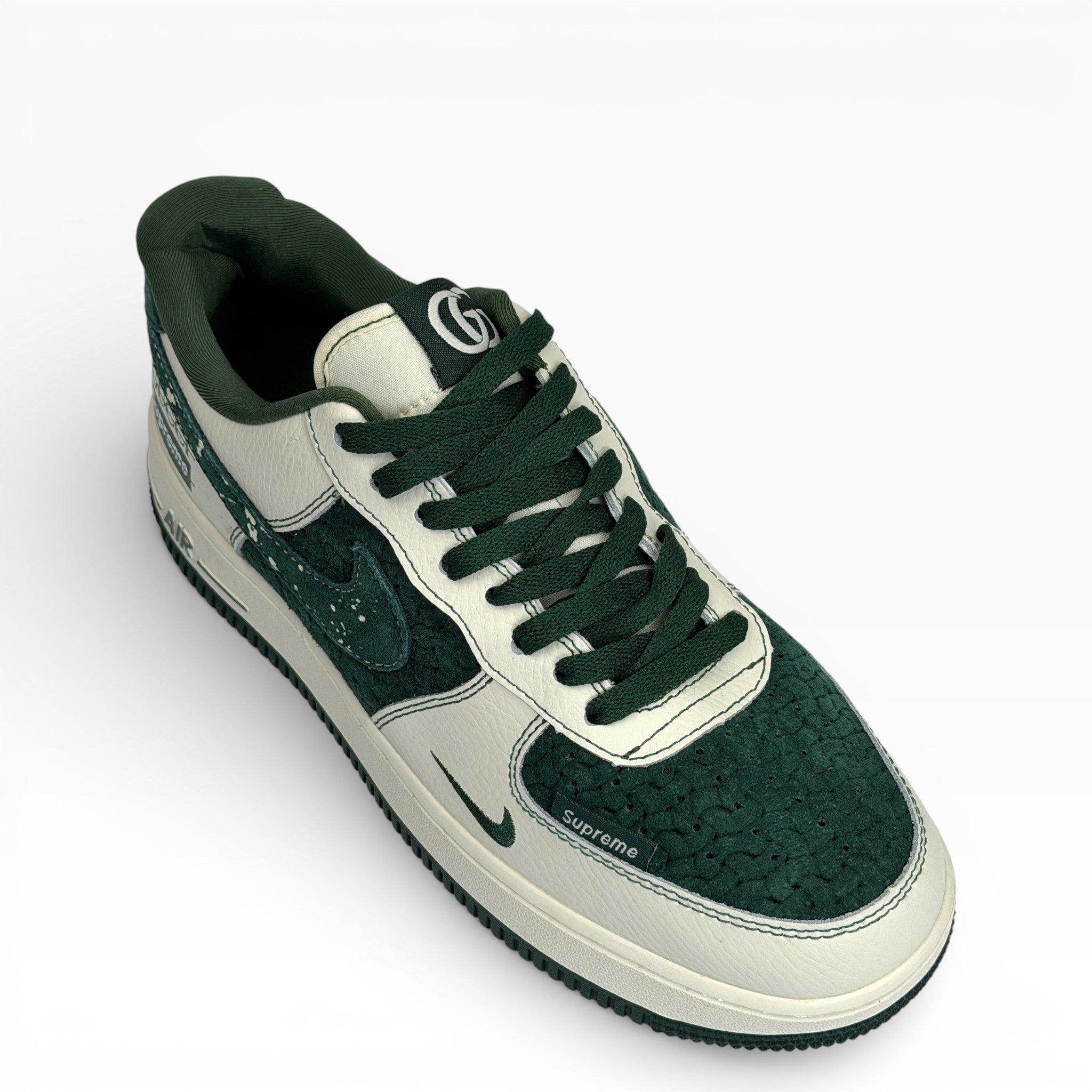 Nike Air Force 1 Low in a custom green and white colorway with Gucci and Supreme branding