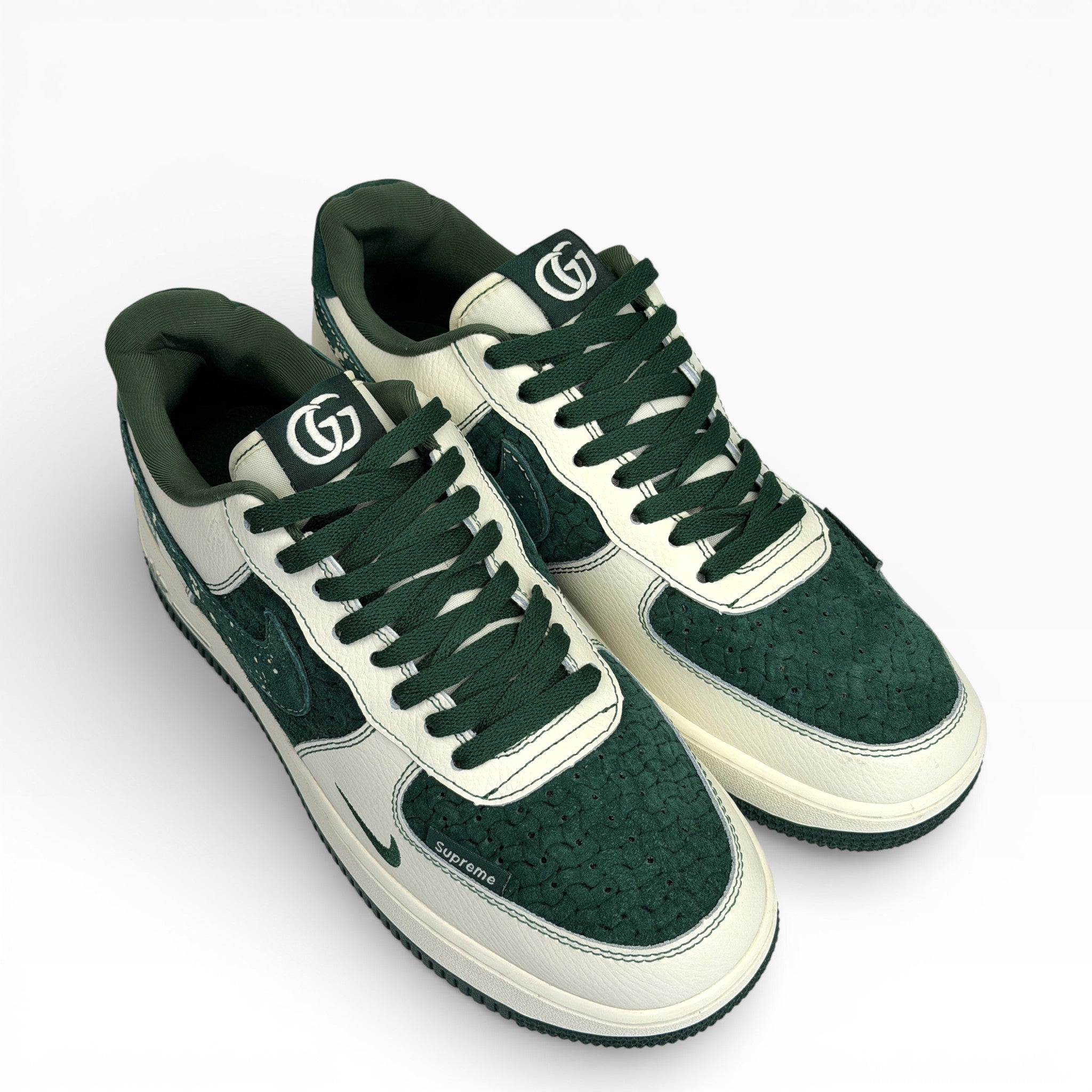Nike Air Force 1 Low in a custom green and white colorway with Gucci and Supreme branding